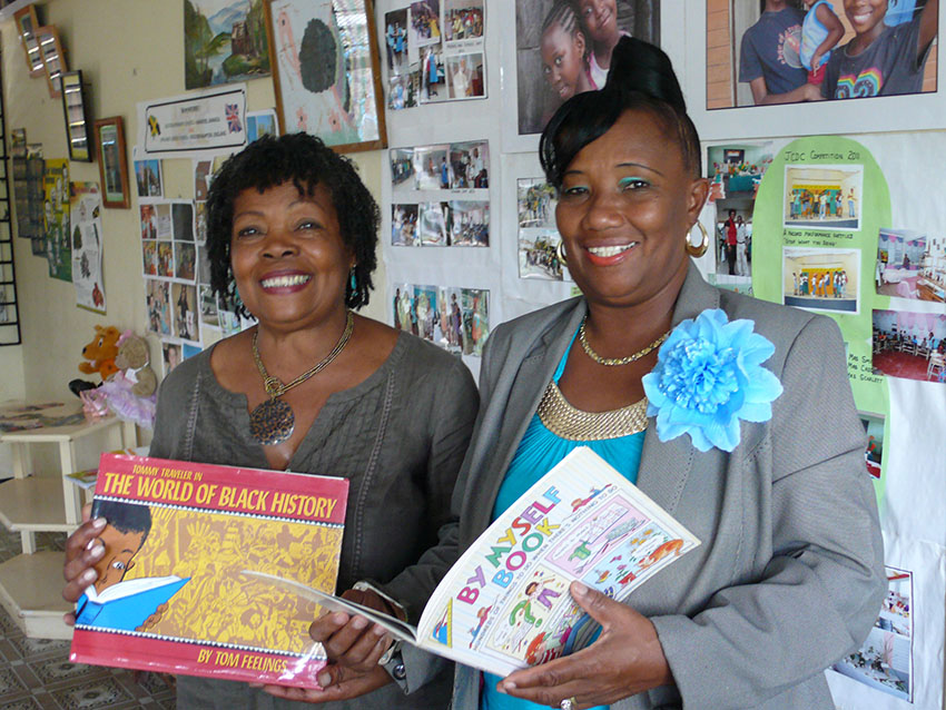 The first delivery of books to Cacoon School in April 2013: me with the principal Mrs Carol Grant